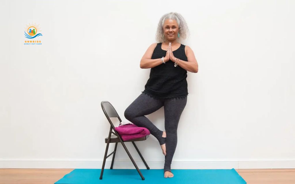 yoga poses for seniors: Supported tree pose (balance trainer)