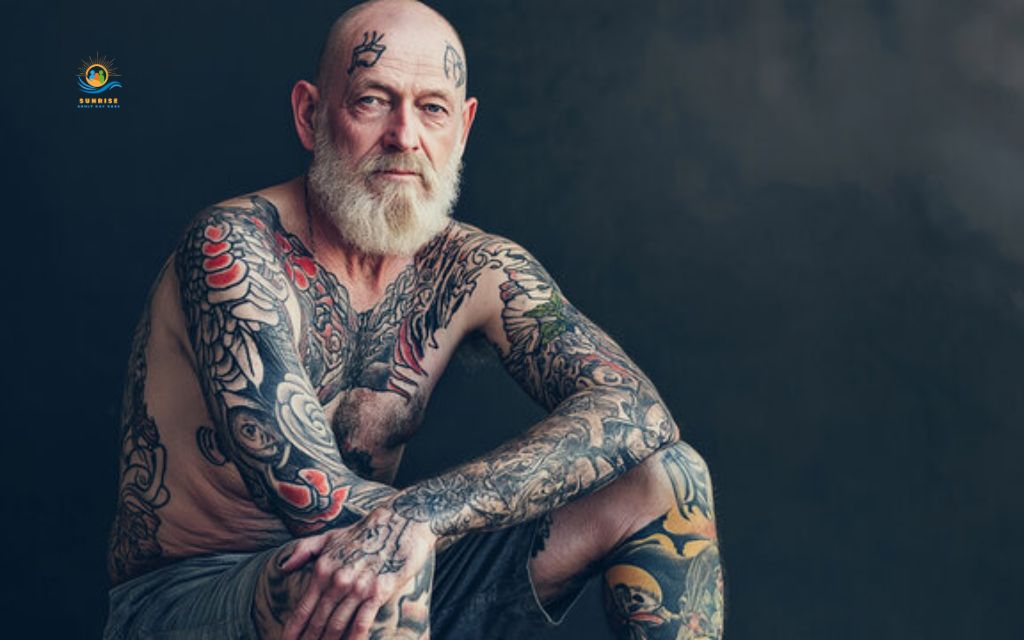 elderly person with tattoos: "A tattoo earned young becomes a memory kept forever."